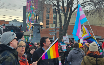 Edmontonians protest policy changes affecting trans youth with vibrant rally
