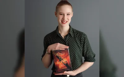 Meet the independent author behind the dark sapphic fantasy book When Two Roads Meet
